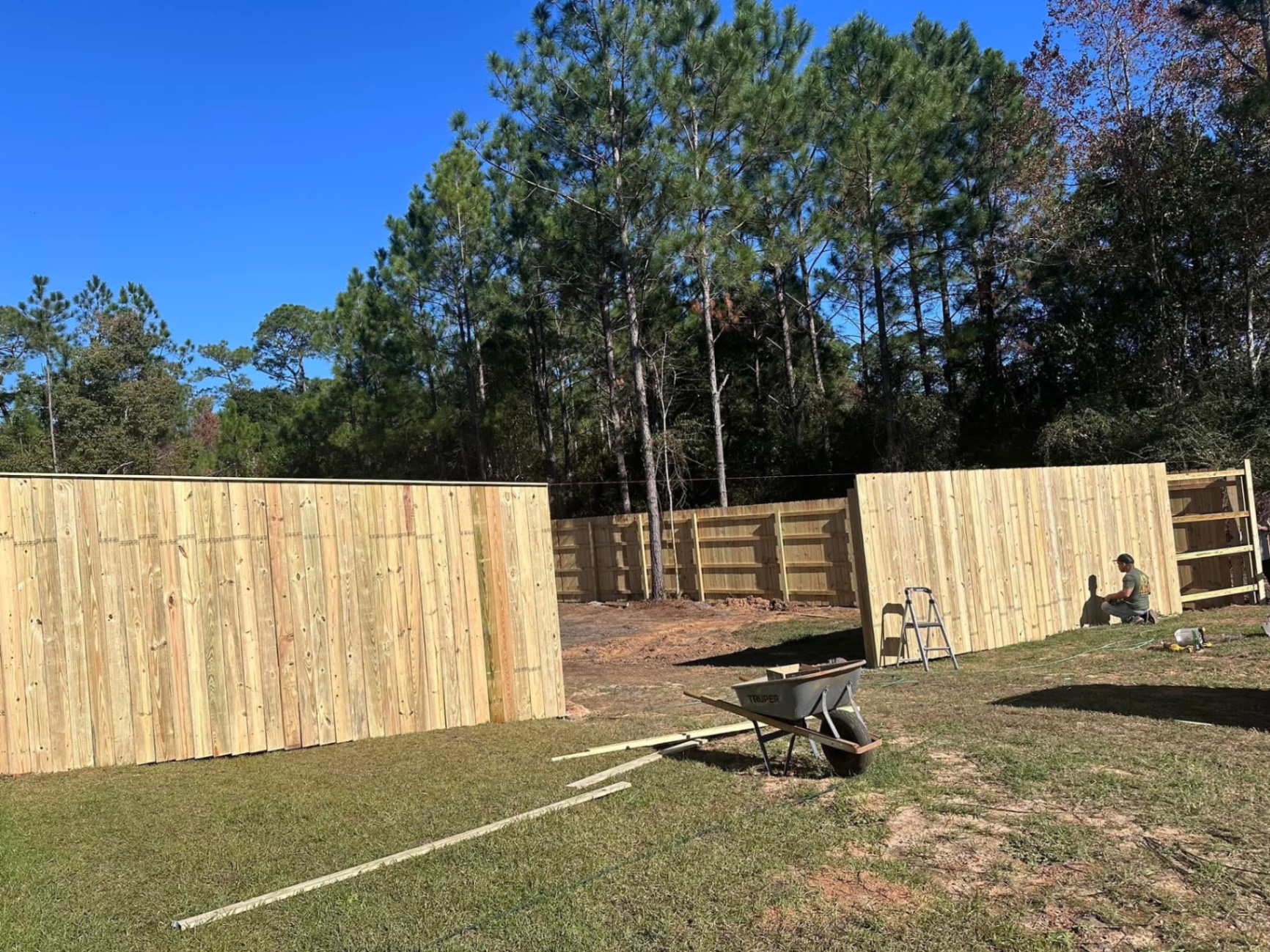 New wood privacy fence being installed